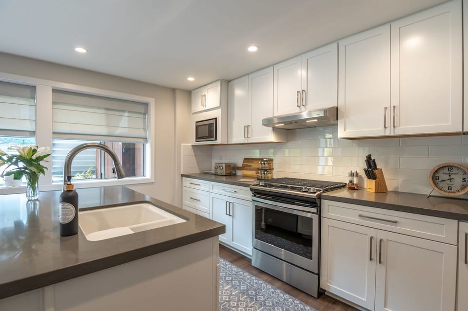 Gas range, full size dishwasher, & microwave. 