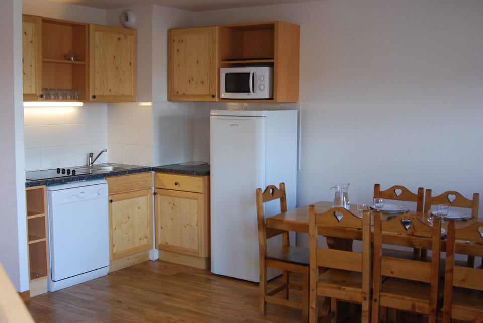 Prepare a meal in the equipped kitchen.