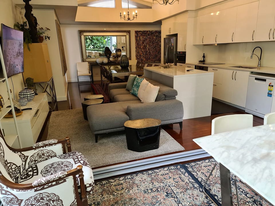 conservatory + Kitchen and living area.