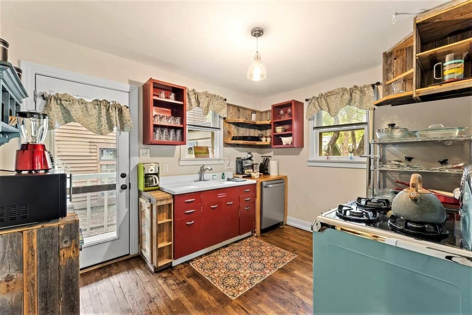 Original metal kitchen cabinets from 1940s plus hand made shelving
