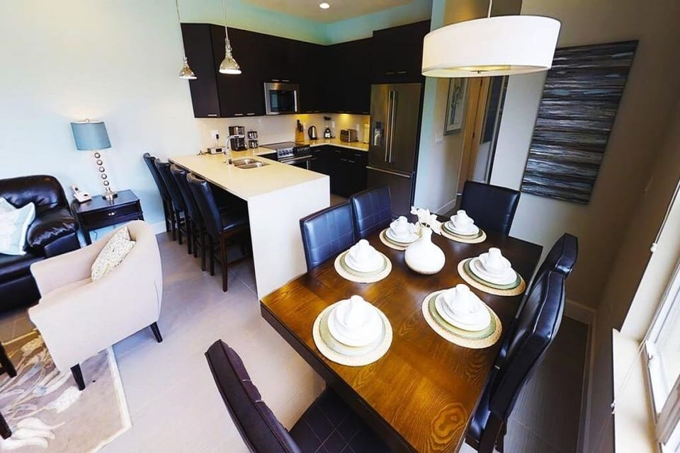 Formal dining area next to the stylish fully-equipped kitchen