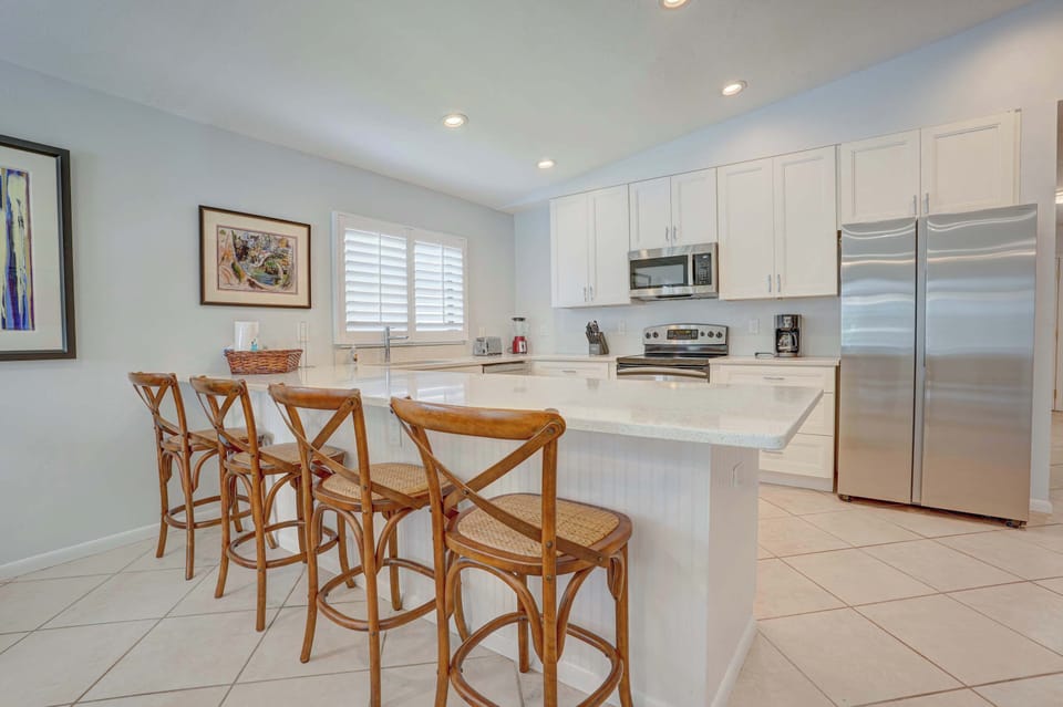Freshly Renovated, Bright & Modern Kitchen Beautiful with Barstools