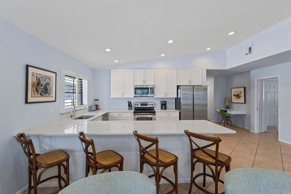 Freshly Renovated, Bright & Modern Kitchen Beautiful with Barstools
