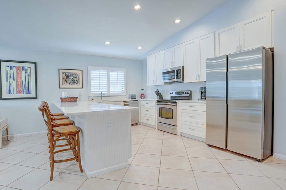 Freshly Renovated, Bright & Modern Kitchen Beautiful with Barstools