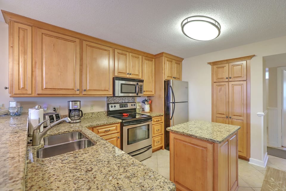 Kitchen. Crock pot, toaster, both a 12 - cup drip and a Keurig coffee maker.
