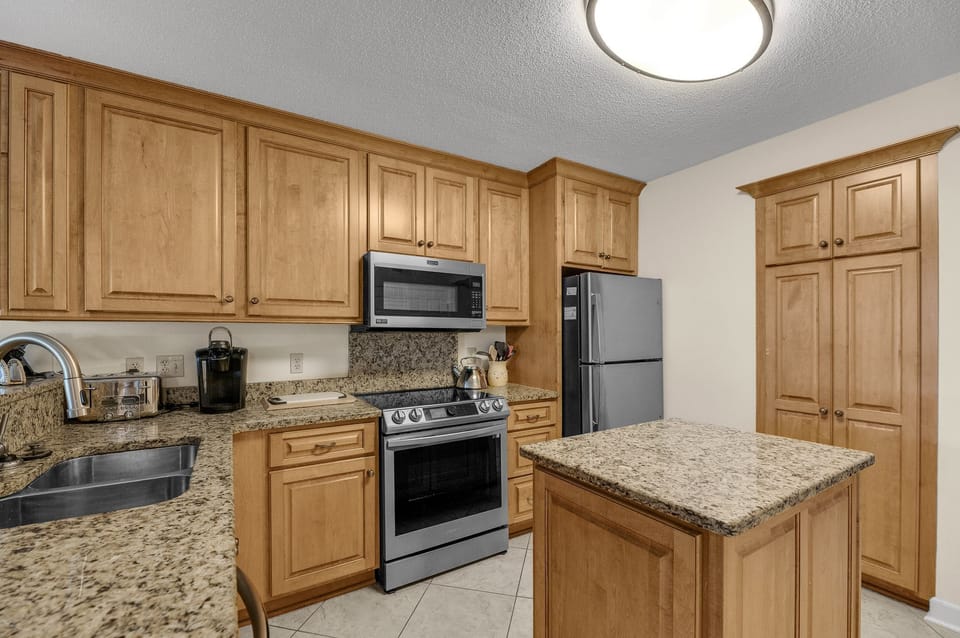 Kitchen, with cupboard on the right for the guest's food.
