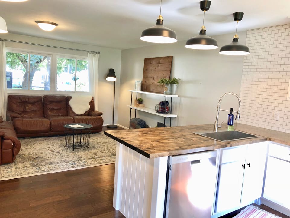 You'll love the open concept, fully stocked kitchen!
