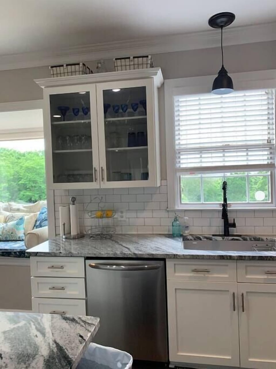 New granite, backsplash and cabinet fronts in our renovated kitchen.
