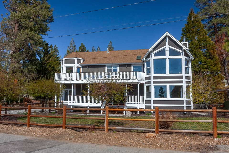 Luxury two story home offering panoramic lake views from nearly every room! 