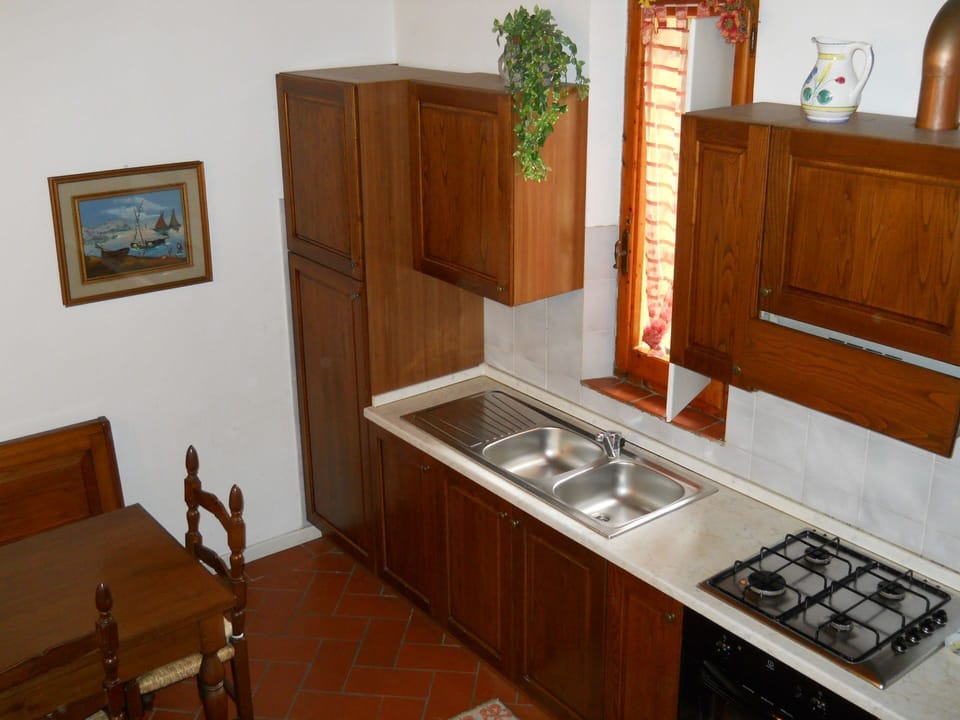 Room, Furniture, Property, Cabinetry, Countertop, Wood Stain, Kitchen, House, Building, Hardwood