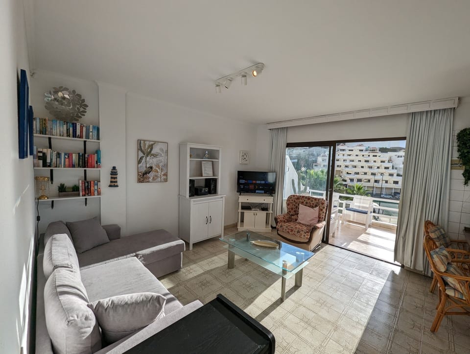 Step into a cozy living room designed for relaxation and entertainment