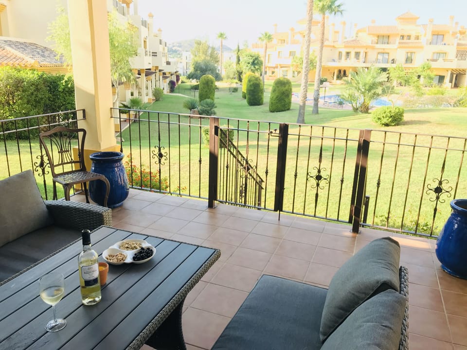 Veranda overlooking Gardens and Pool