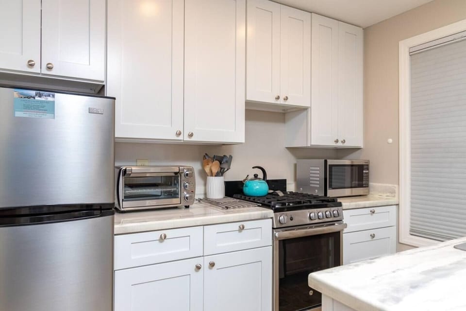 Coffee maker, toaster oven, full fridge, oven/stove, microwave