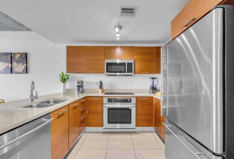 "Cook with ease in this Airbnb vacation rental featuring a modern kitchen and sleek design."

