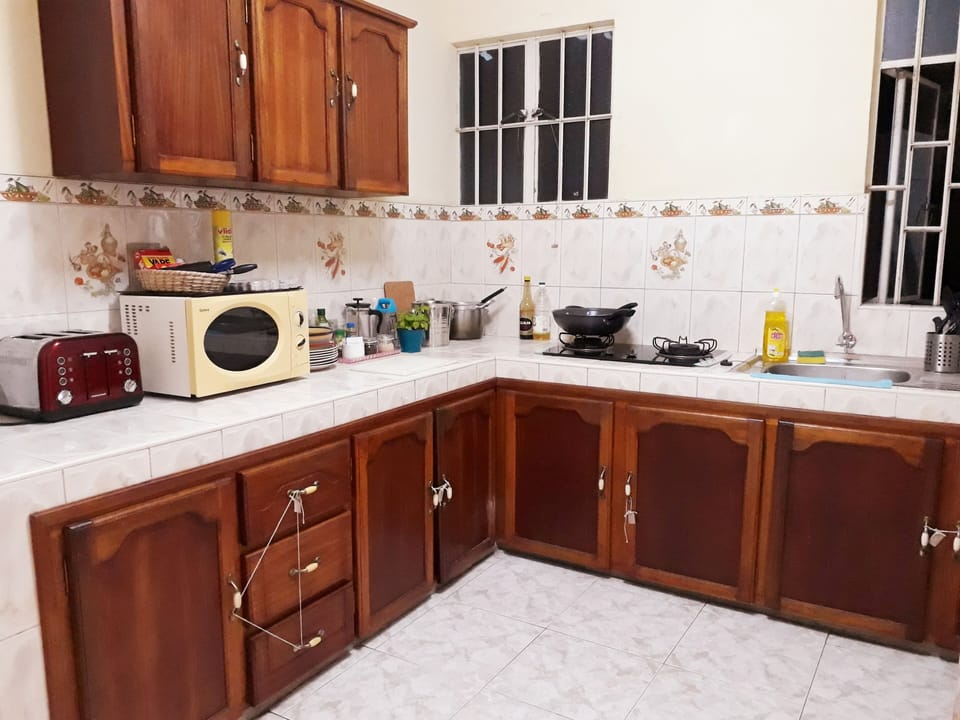 Spacious kitchen with basic equipment for holiday cooking.