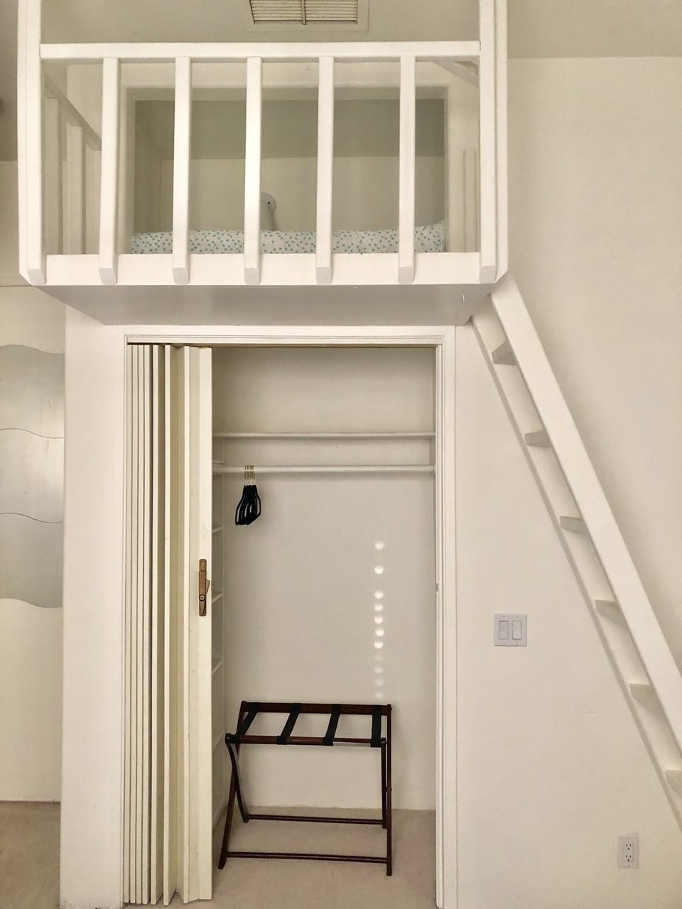 Upstairs in the loft is a twin bed sleeps one adult or child 