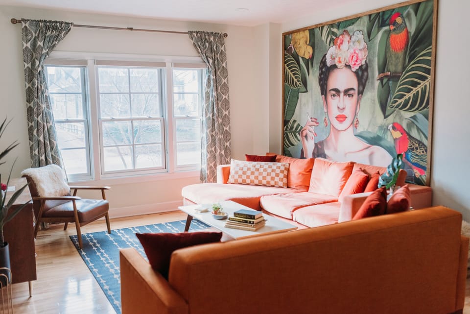 Lots of natural light and comfortable seating in the living room.