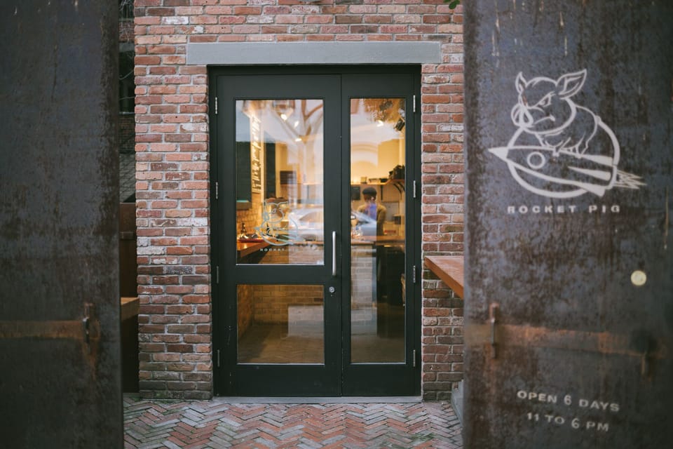 Tiny sandwich stop offering a signature smoked pork sandwich, located in Chelsea