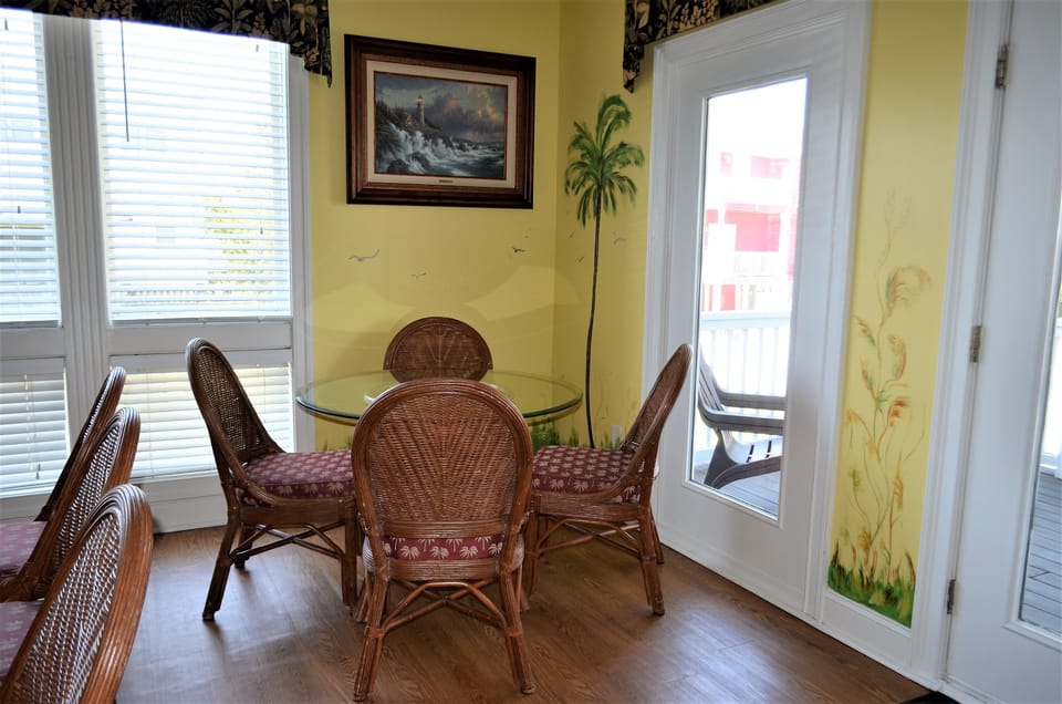 2 tables in the dining area plus extra bar seating