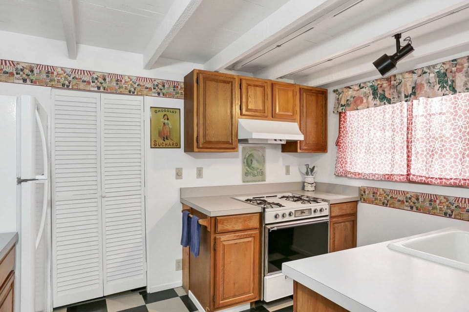 The kitchen has pretty much everything you might need to plan a great summer meal using the BBQ out front!