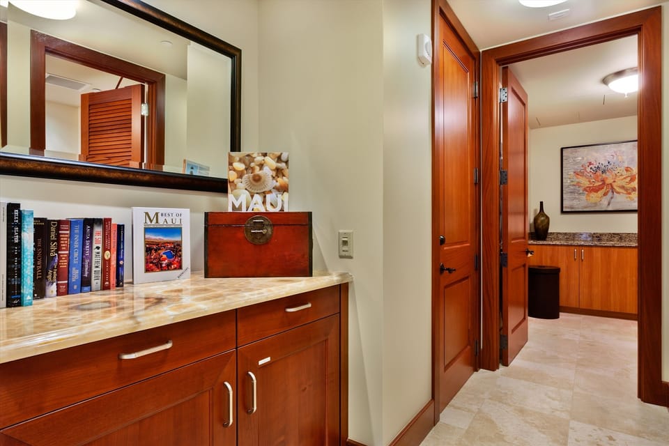 Fully Equipped In-Villa Laundry Room with Abundant Cleaning and Laundry Supplies