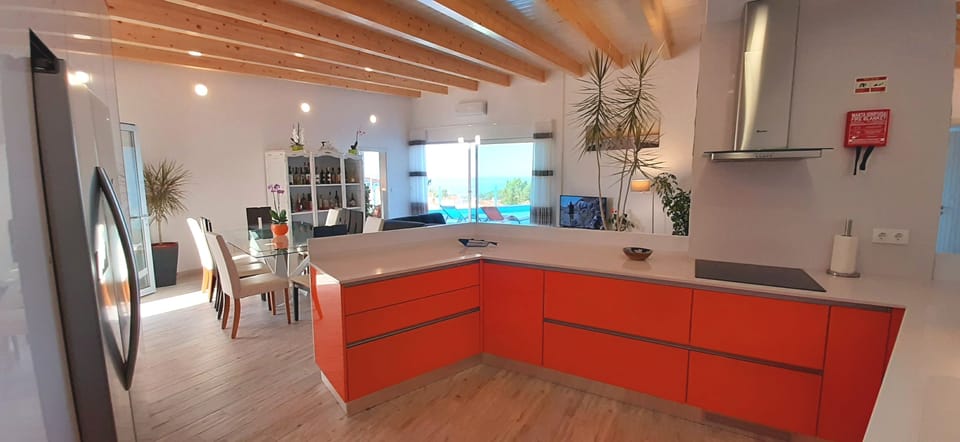 Fully equipped kitchen with sea view