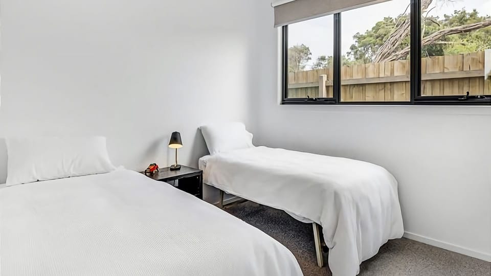 Room boasts a single bed and trundle, accommodating friends and family on your vacation.