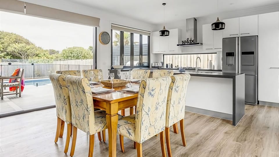 Meals can be enjoyed at the 8 seat inside dining table.