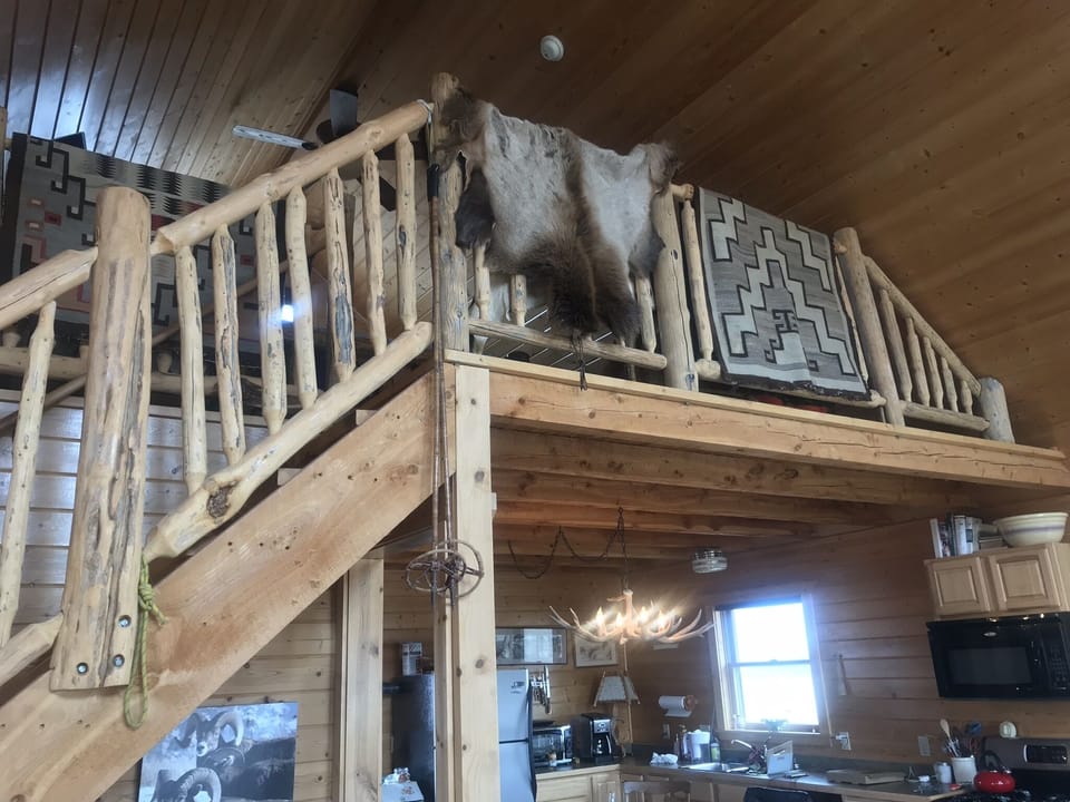 rustic charm. staircas to the loft