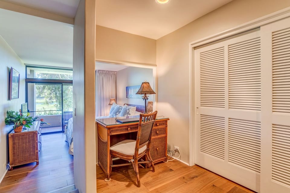 Master bedroom with open space, desk area and additional lanai access
