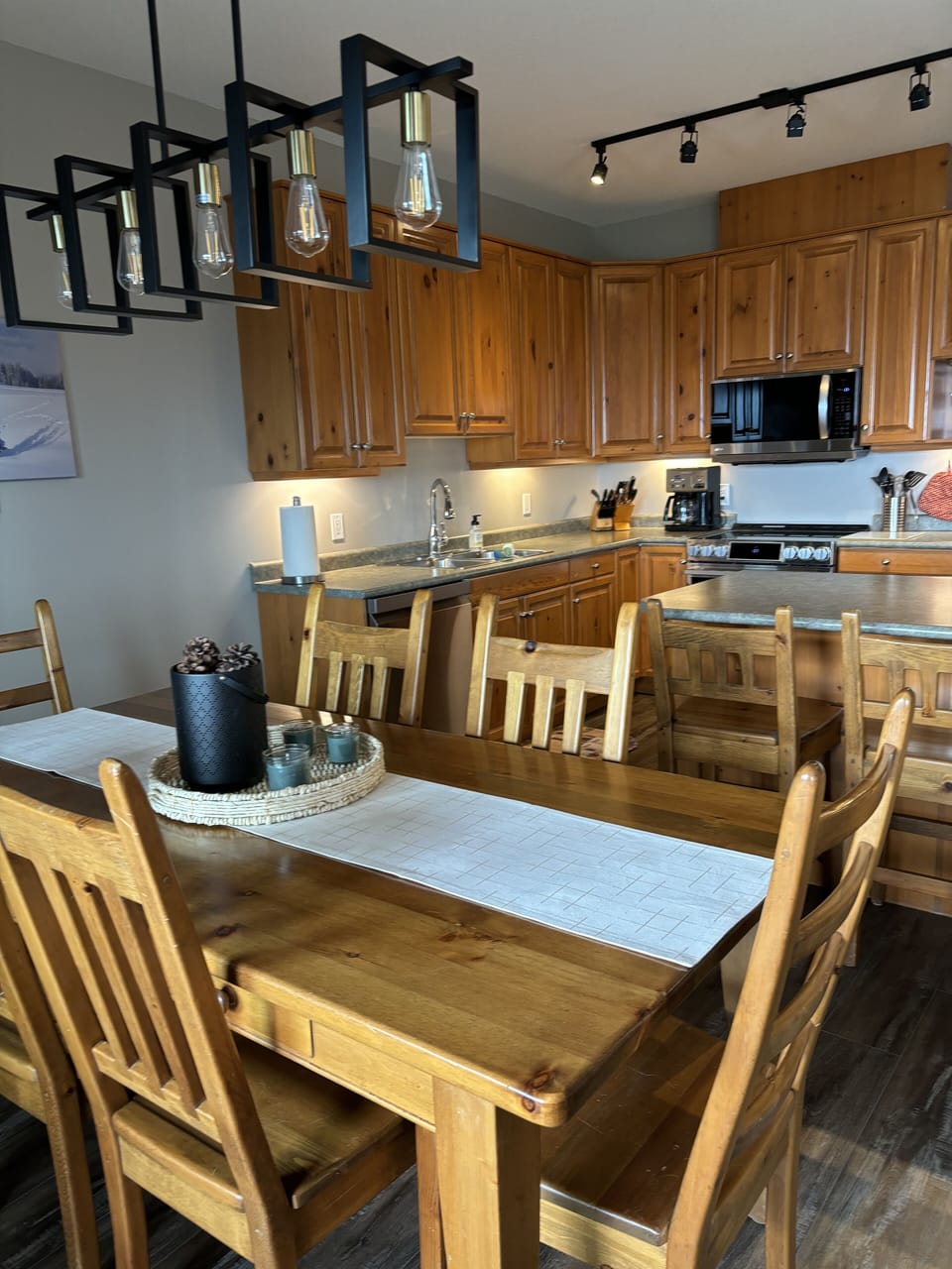 Dining room and kitchen with island.