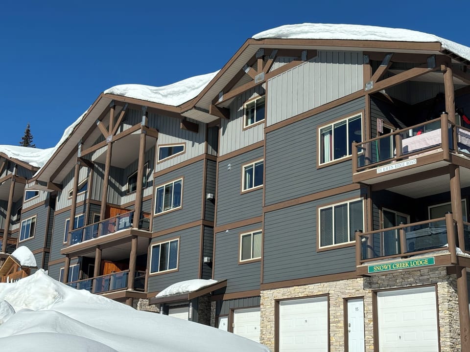 Front of the building from driveway off of Raven's Ridge Drive.
