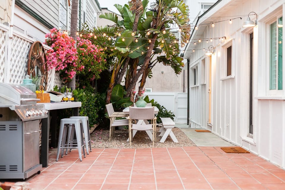 Side yard for enjoying family dinners and barbecuing.