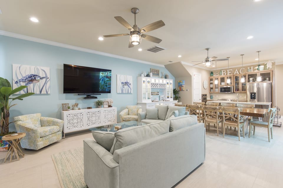 Open concept living, dining, and kitchen space