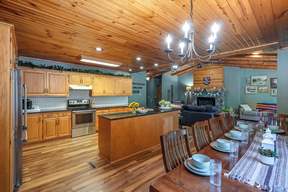Open concept kitchen, dining, and living area