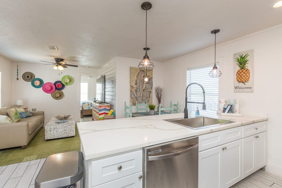 The open kitchen allows you to interact with family and friends.
