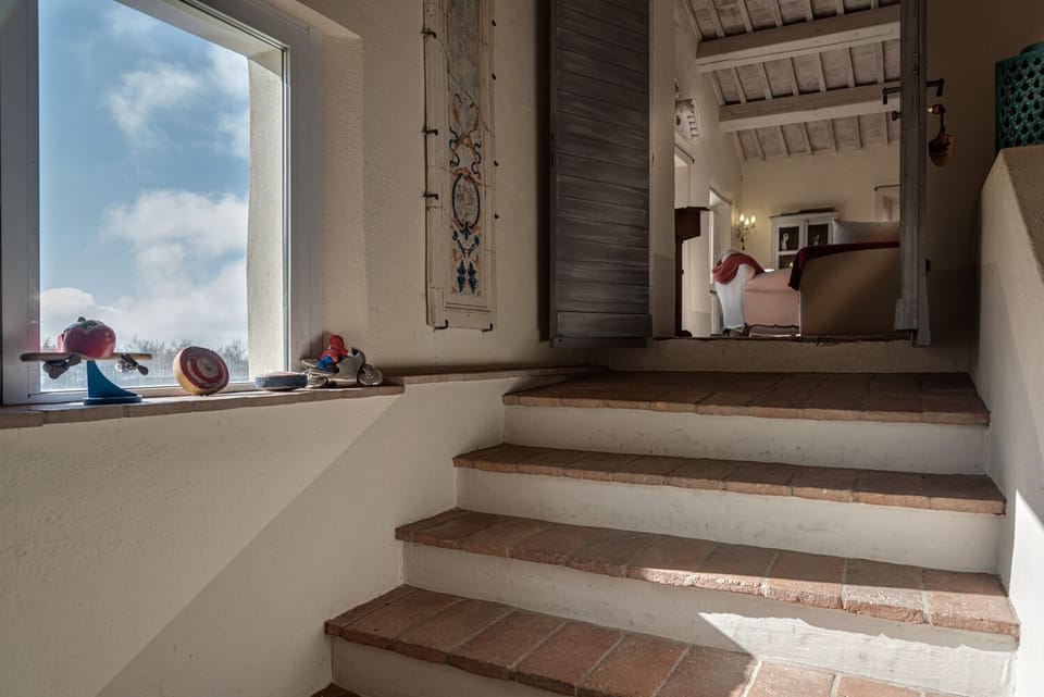 Staircase to first floor living room and two bedrooms 