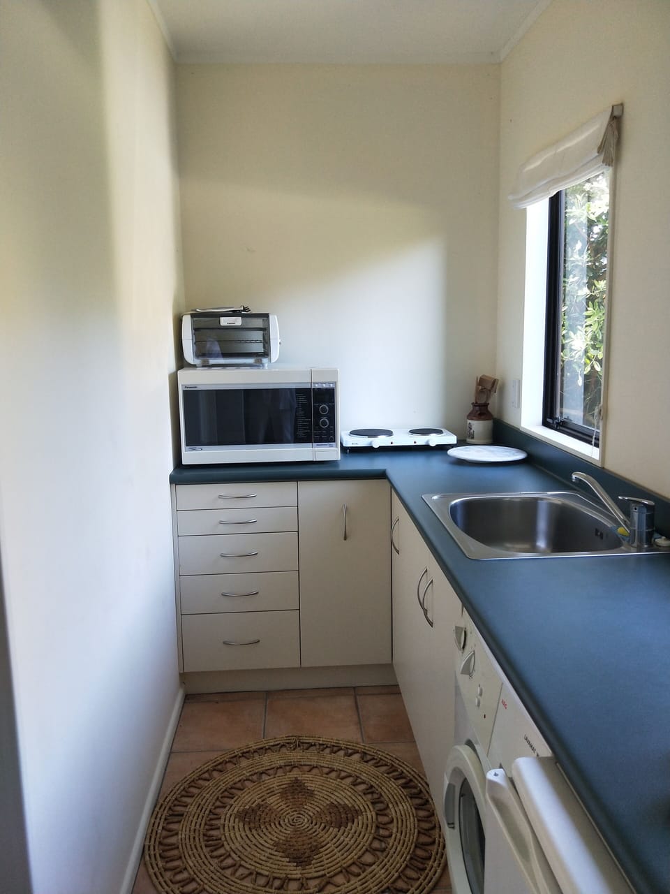 Downstairs kitchenette and laundry