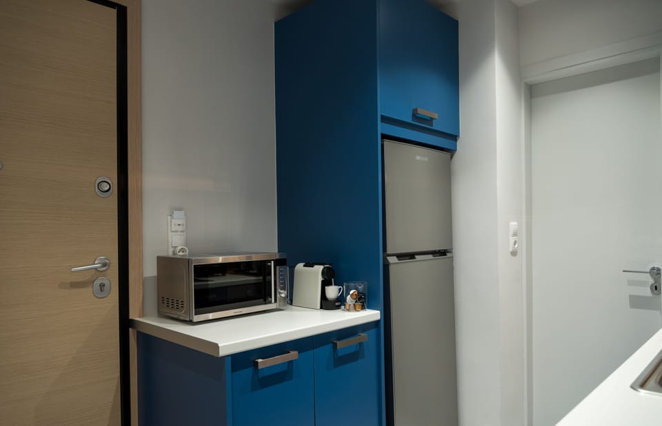 Refrigerator, Microwave and below the Washing Machine 