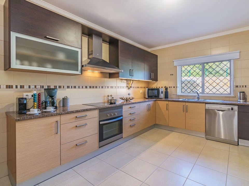 Property, Room, Kitchen, Cabinetry, Furniture, Real Estate, Building, House, Yellow, Countertop
