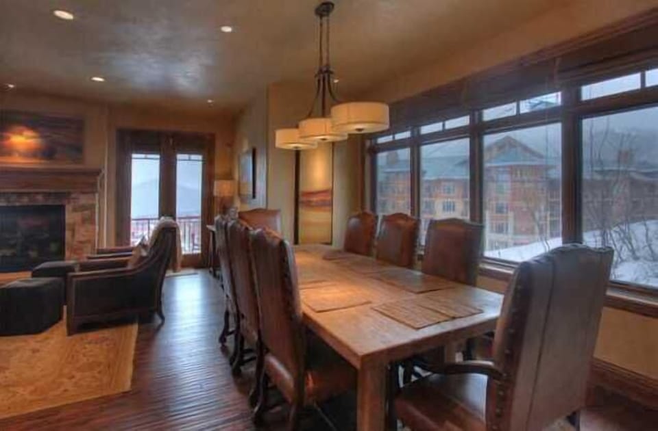 Dining area easily seats 8 with lots of natural light and mountain views