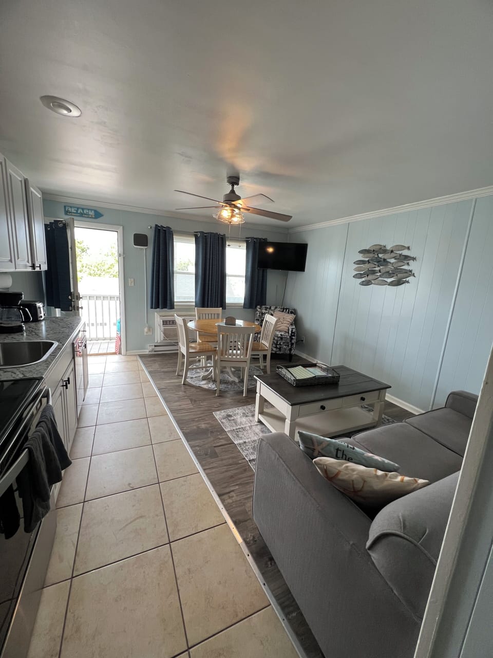 living room features a new chair, and a fresh coat of paint 2026