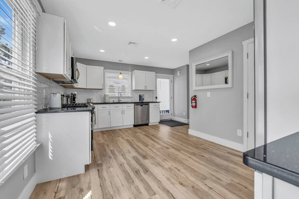 Entrance to the unit is from the glass door to the right of the kitchen.
