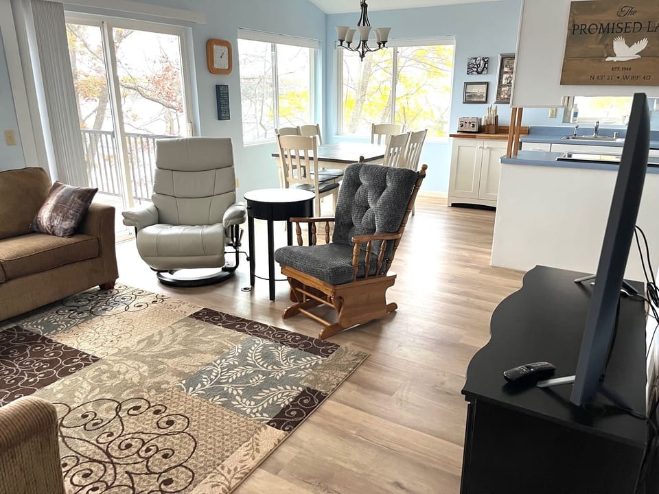 great room concept living area with TV