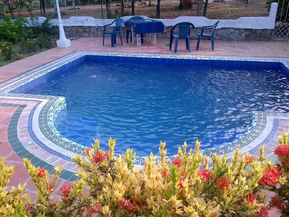 ENCANTADORA CASA CON LINDAS ZONAS VERDES