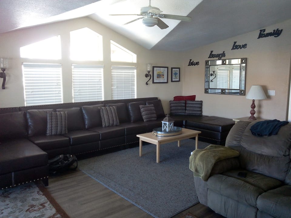 Front Room with plenty of seating and relaxing while watching the river go by