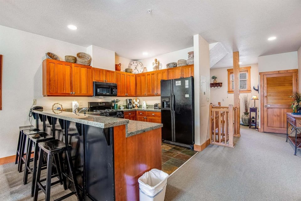 Kitchen is large and provides a breakfast bar - great for breakfast on the go