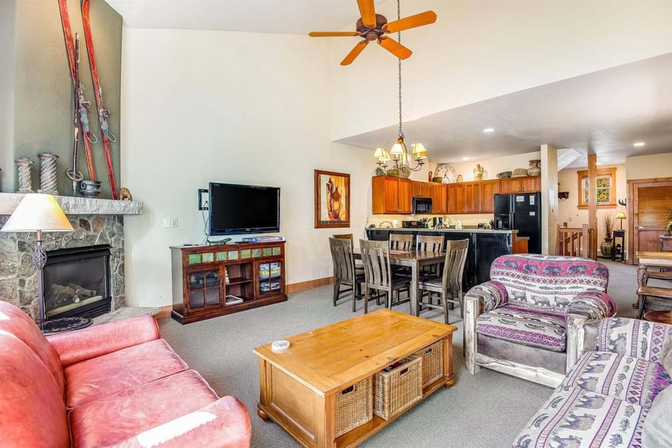 Sofa sleeper in this living room and a warm fireplace to cozy up to