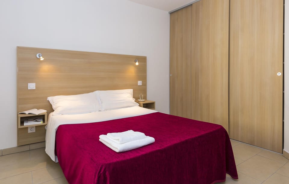 Drift to sleep in the comfortable bed after a wonderful day outside.