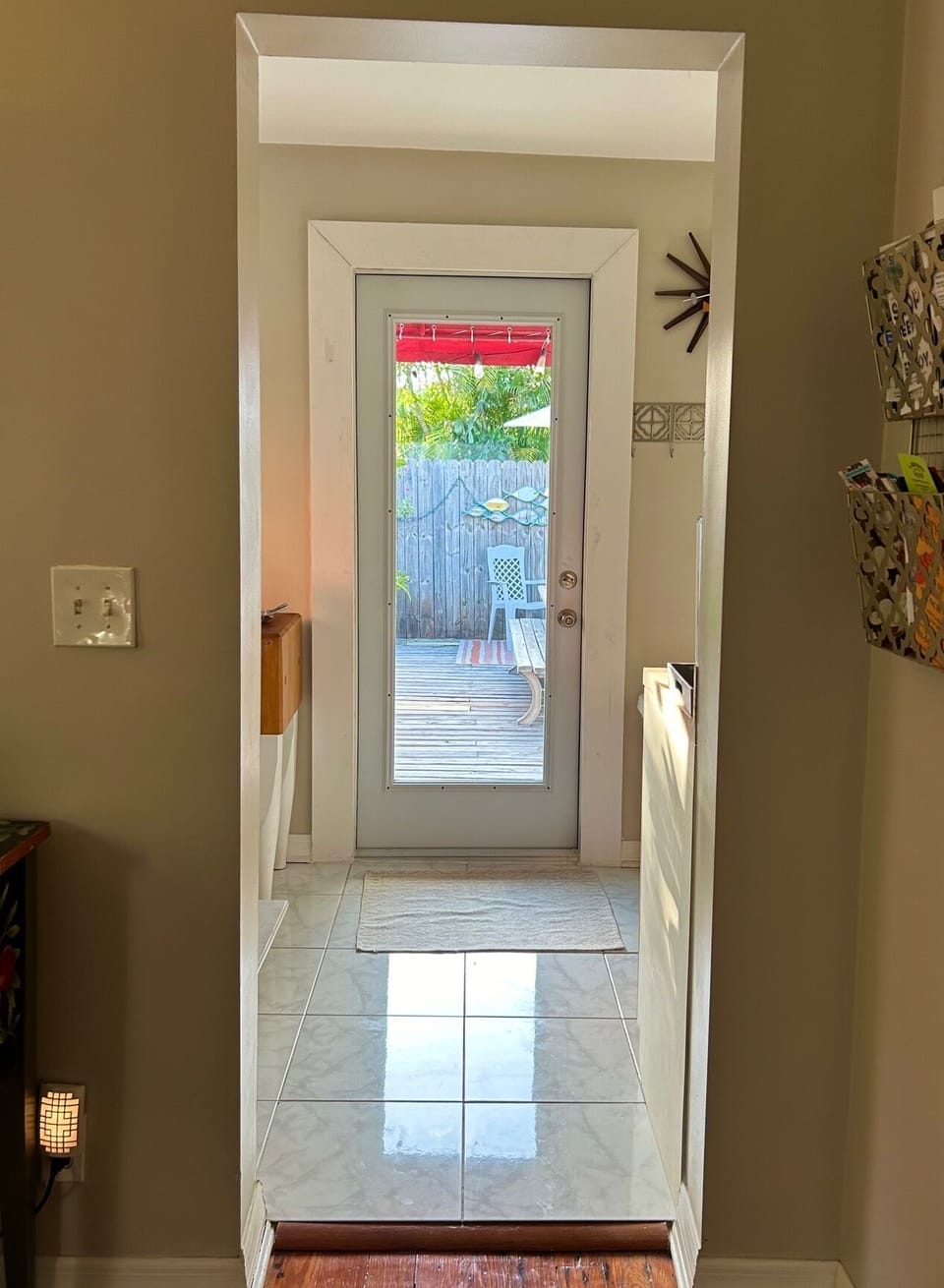 Back door to large patio and both pools.